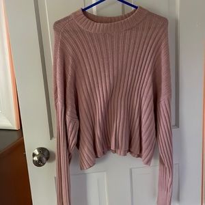 Cropped light pink sweater in good condition